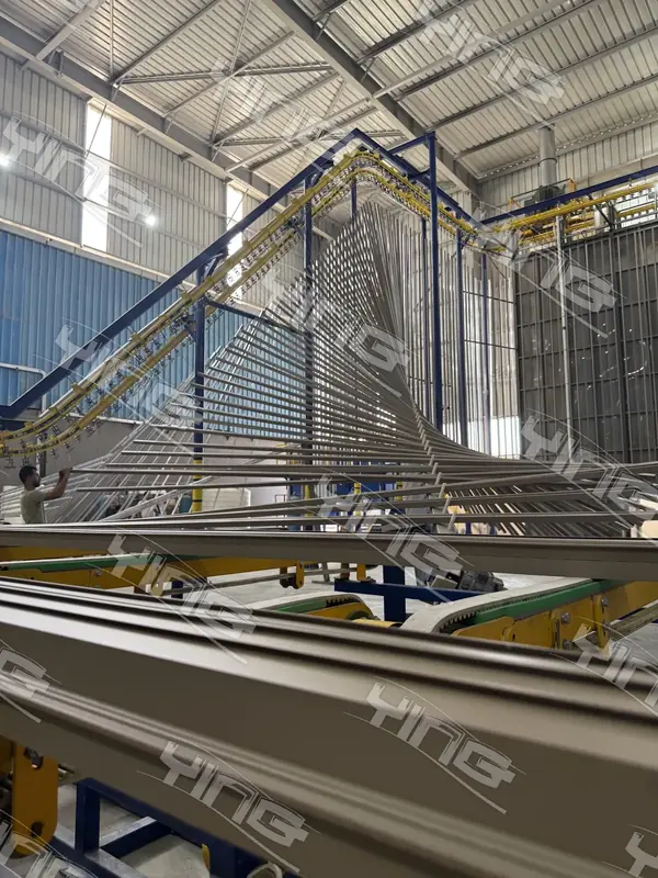 Finished profiles at the unloading station of a coating line