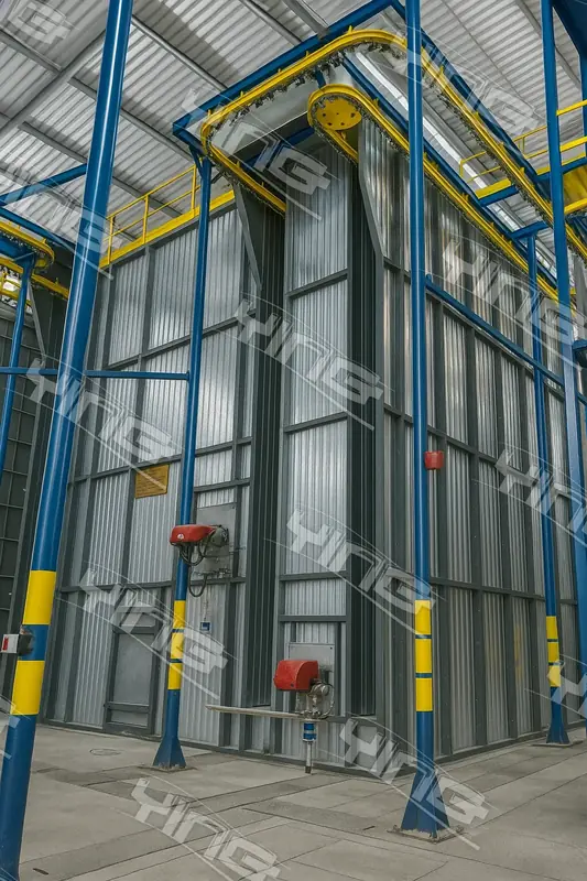 Vertical coating booth tower with clad panelling